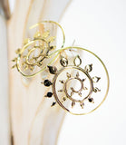 Brass Spiral Earrings with Tiny Leaves - edocollection